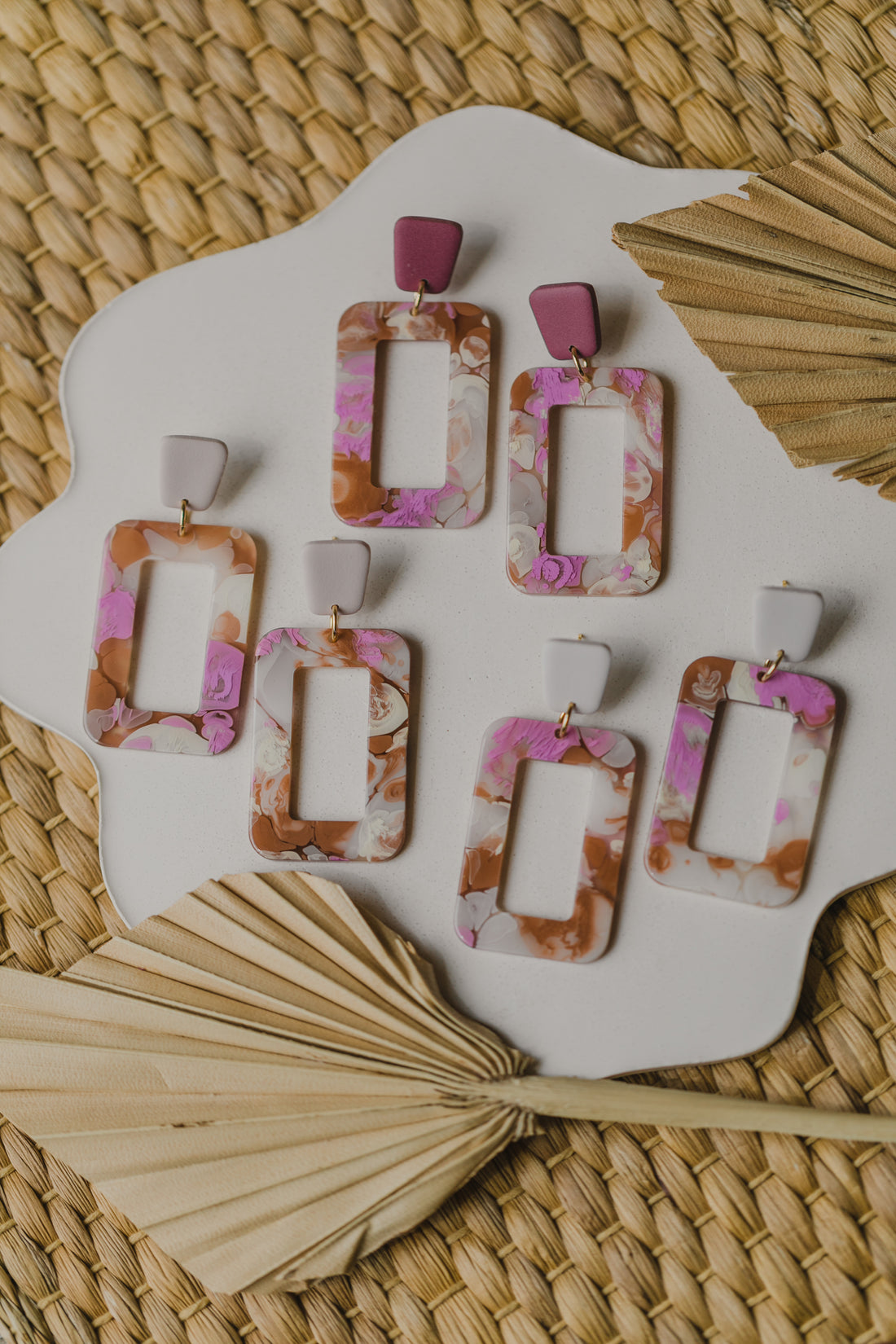 golden earrings with acrylic in white, petrol and brown