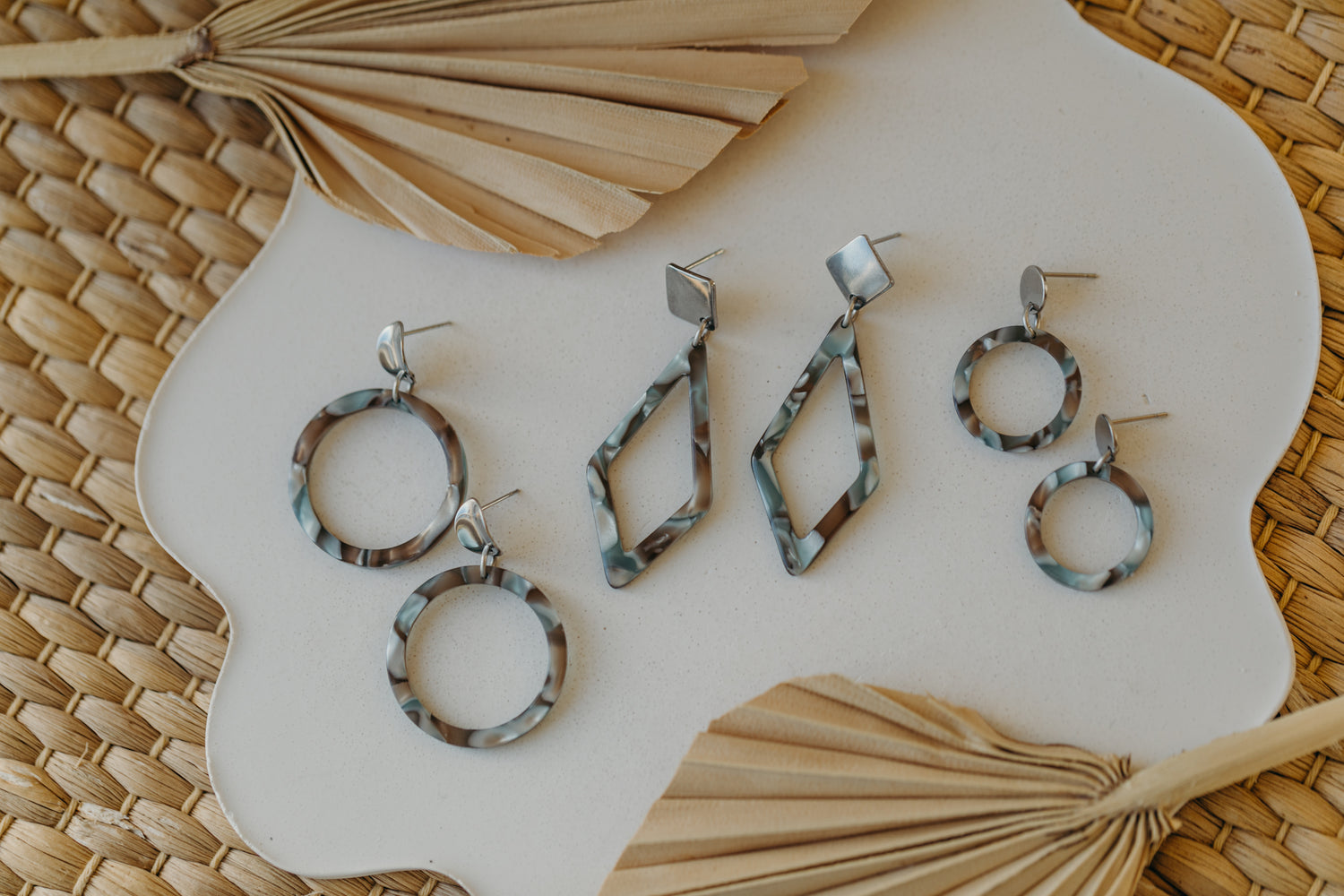 silver earrings with acrylic in white, petrol and brown