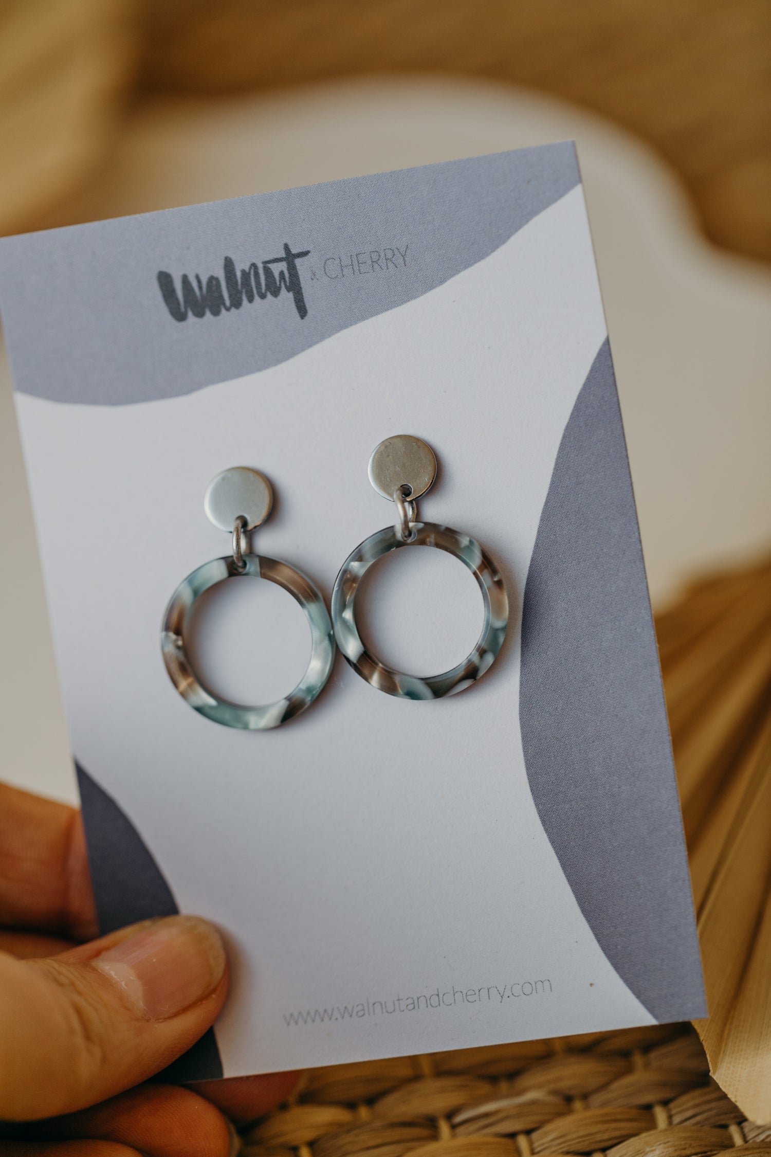 silver earrings with acrylic in white, petrol and brown