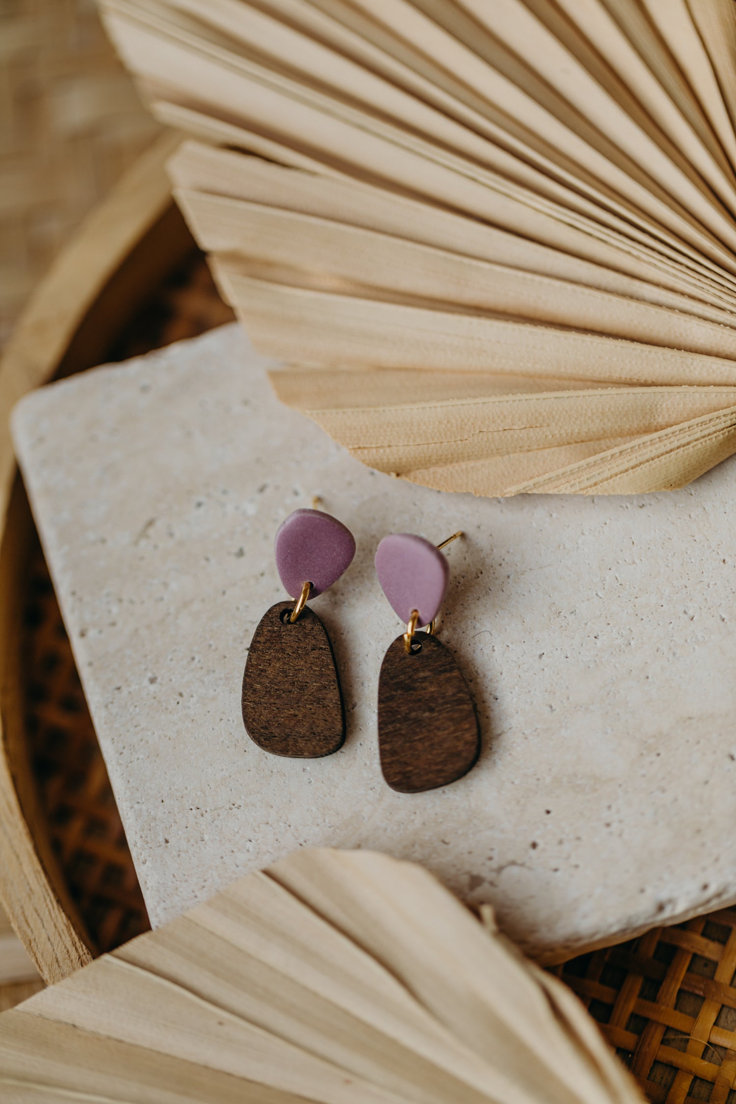 triangular polymer clay earrings in eucalyptus green with rectangular wooden pendant