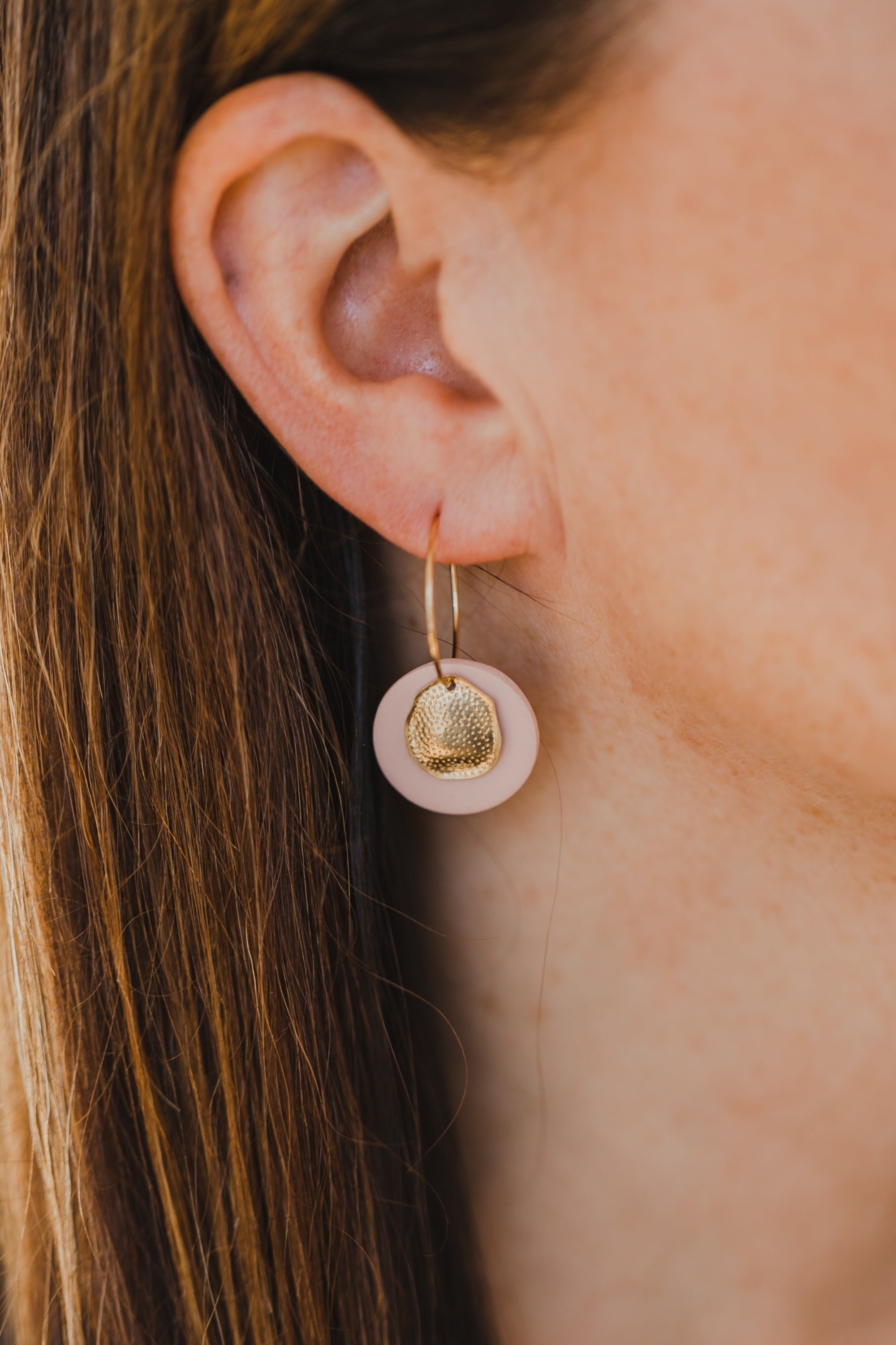 Hoop earrings with round polymer clay pendant and leaf