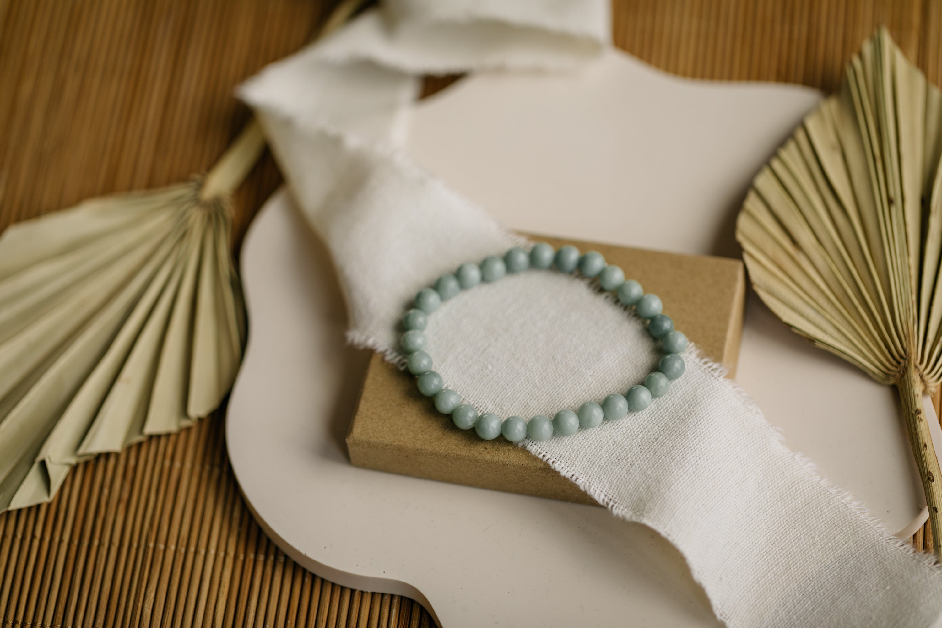 Bracelet with light green jade gemstone beads