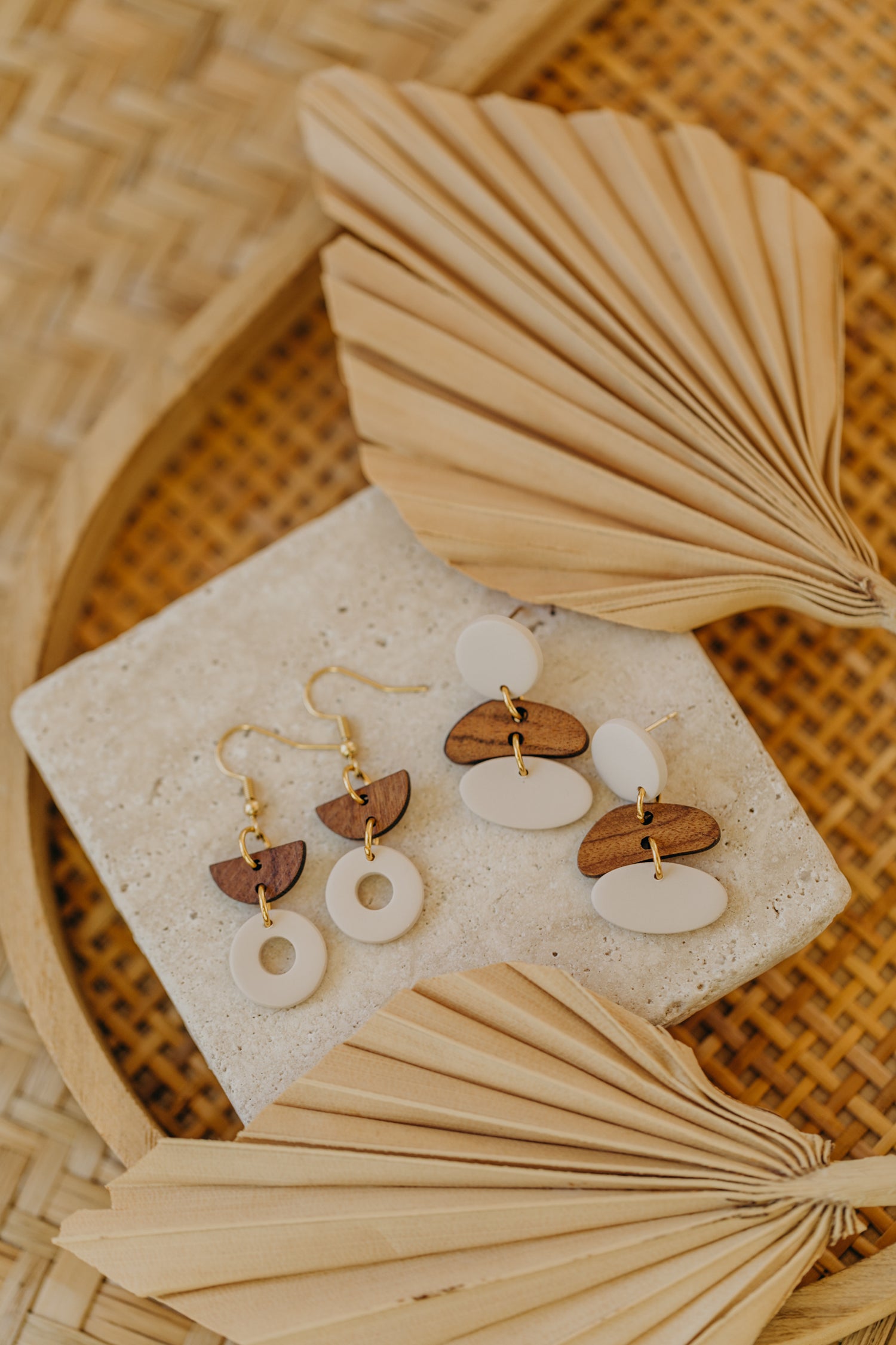 triangular polymer clay earrings in eucalyptus green with rectangular wooden pendant