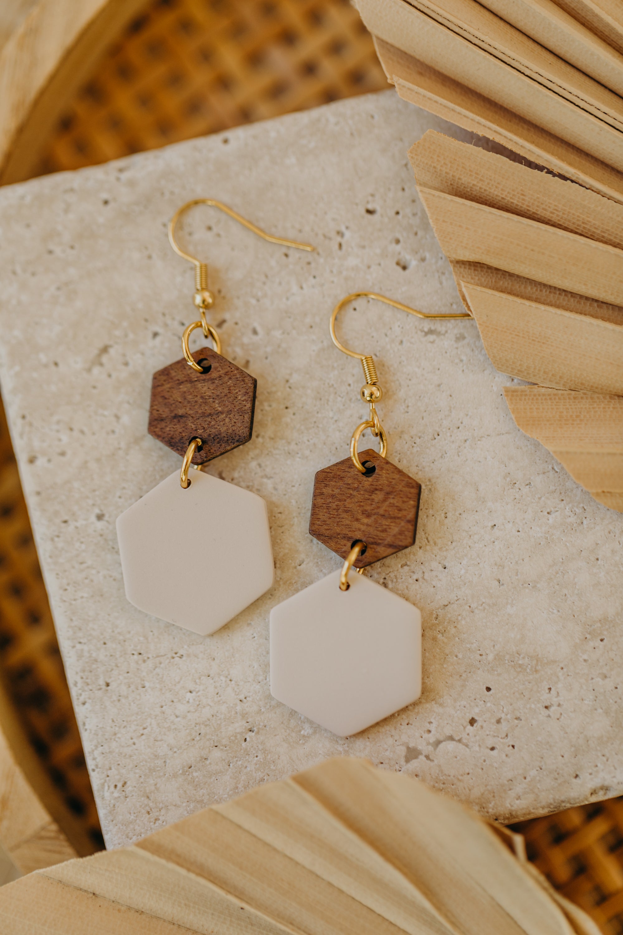 triangular polymer clay earrings in eucalyptus green with rectangular wooden pendant