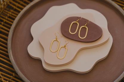 Brass earrings with three circles