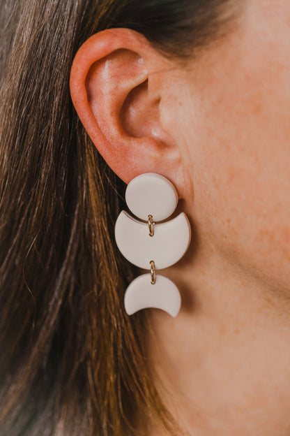 Hoop earrings with round polymer clay pendant and leaf