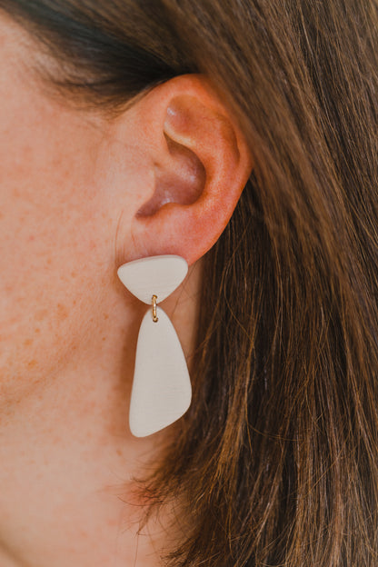 Hoop earrings with round polymer clay pendant and leaf