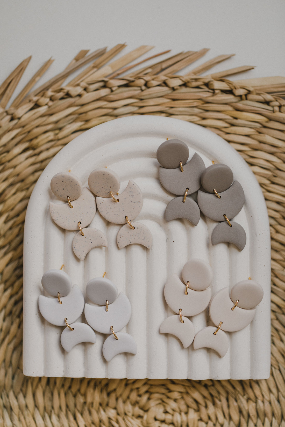 Hoop earrings with round polymer clay pendant and leaf