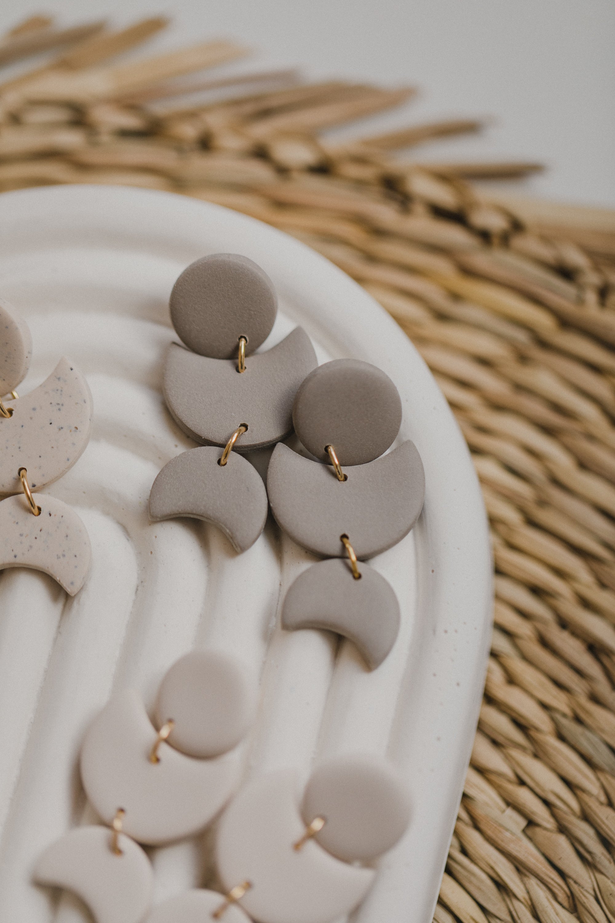 Hoop earrings with round polymer clay pendant and leaf