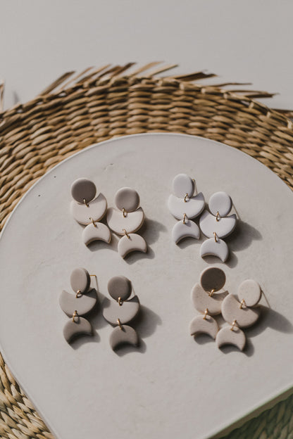 Hoop earrings with round polymer clay pendant and leaf