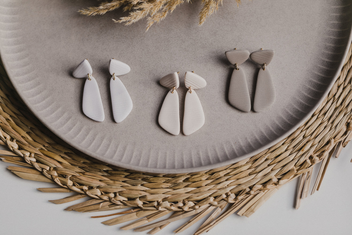 Hoop earrings with round polymer clay pendant and leaf