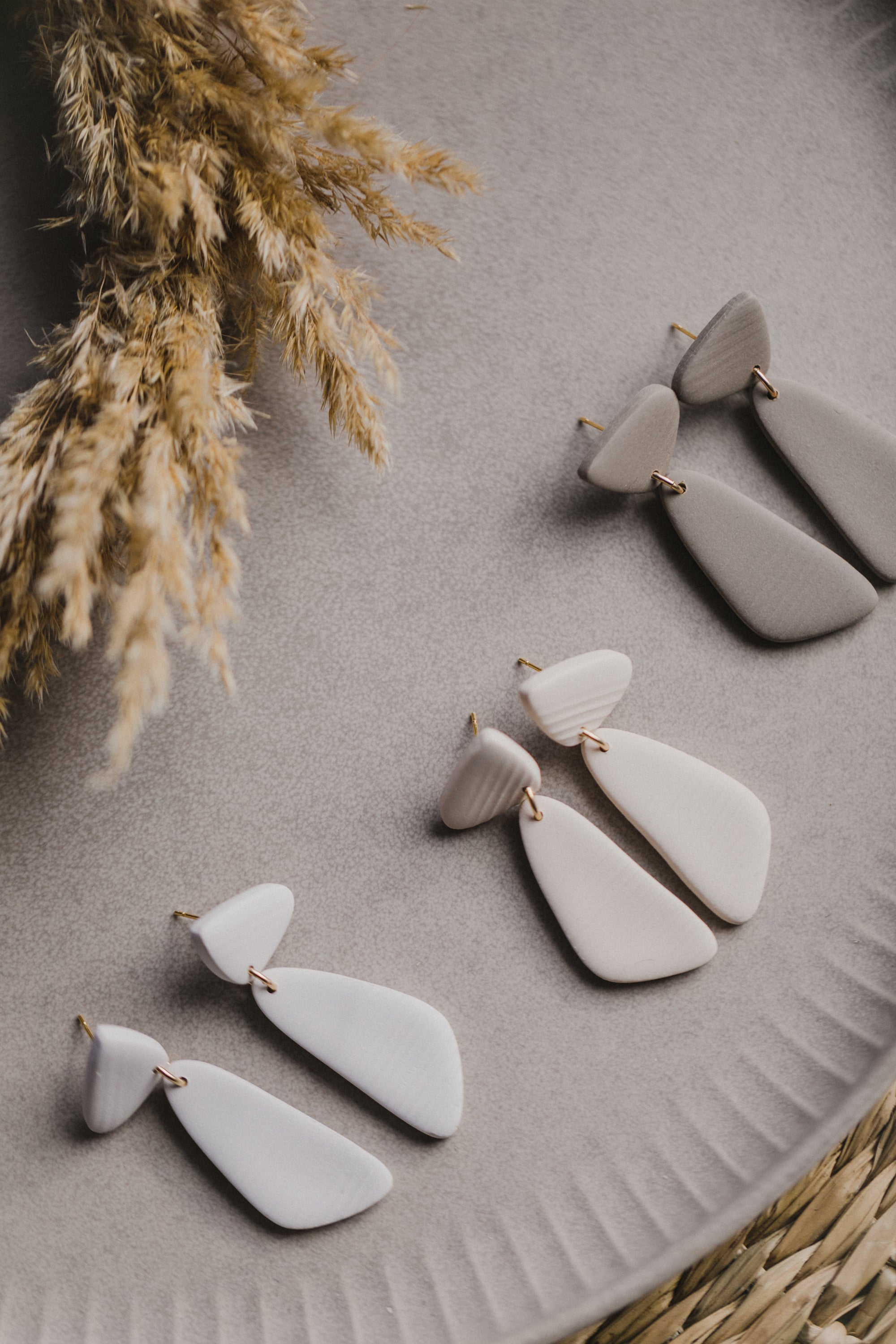 Hoop earrings with round polymer clay pendant and leaf