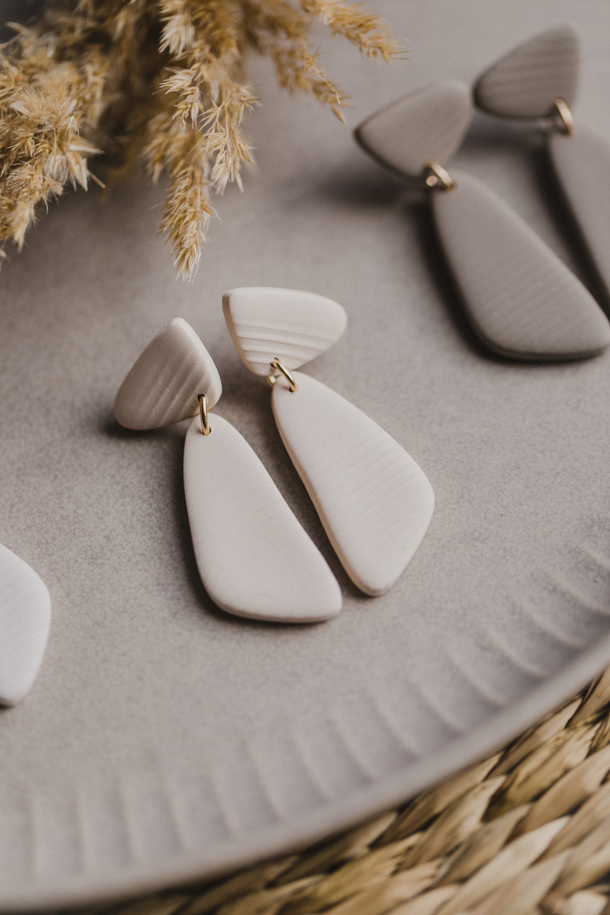 Hoop earrings with round polymer clay pendant and leaf