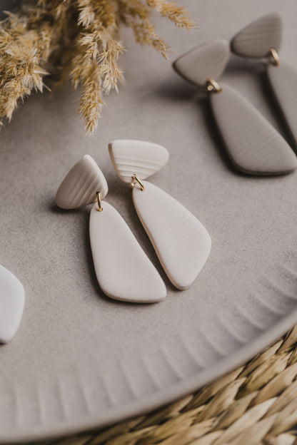 Hoop earrings with round polymer clay pendant and leaf