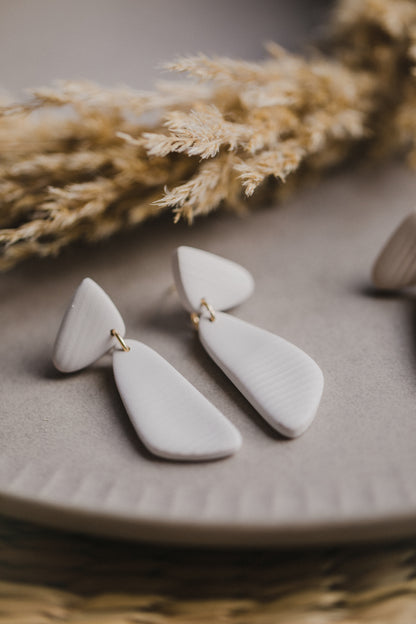 Hoop earrings with round polymer clay pendant and leaf