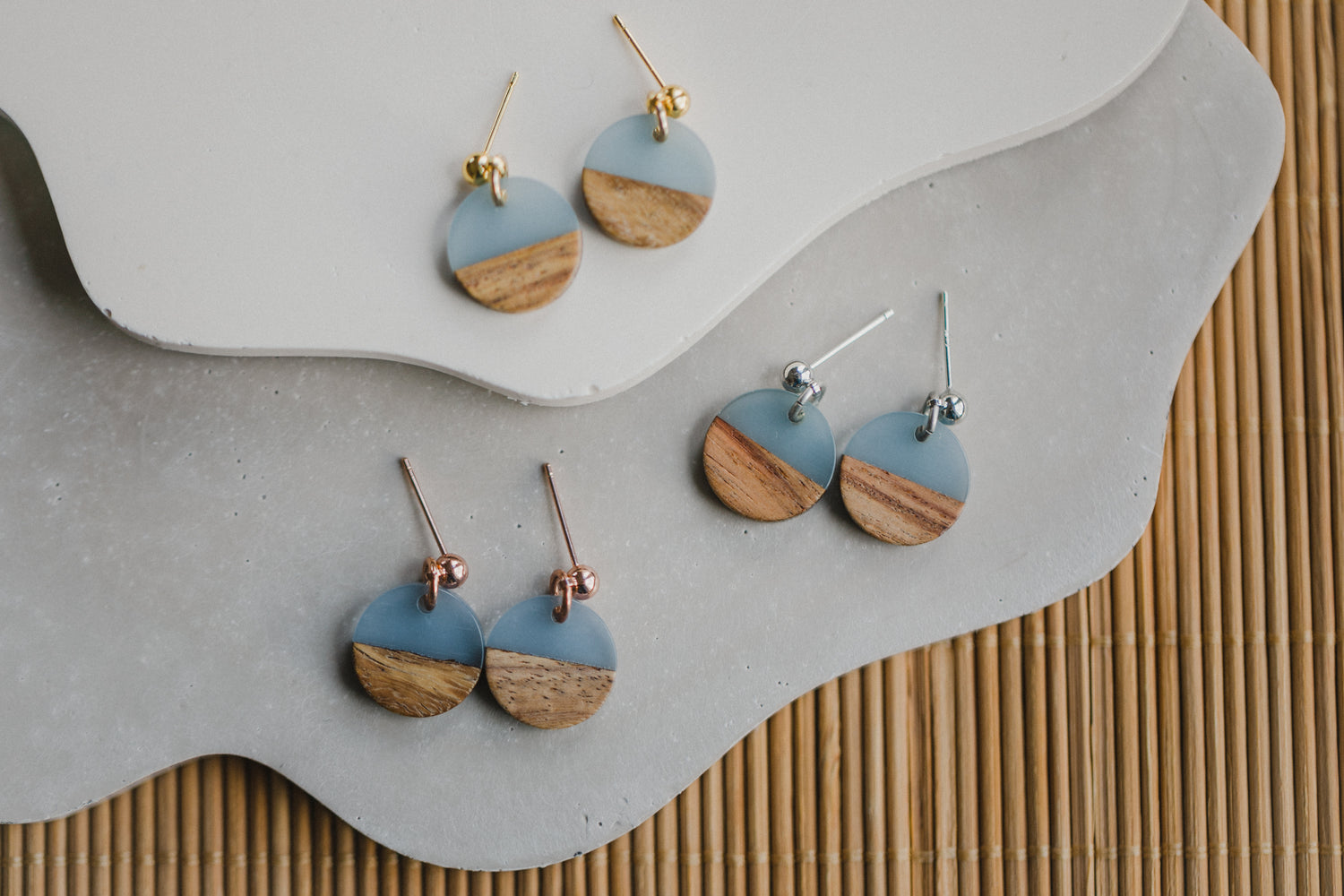 round blue wooden earrings