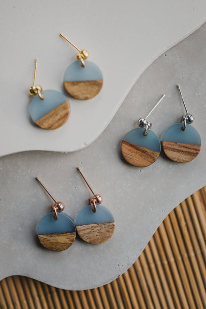 round blue wooden earrings