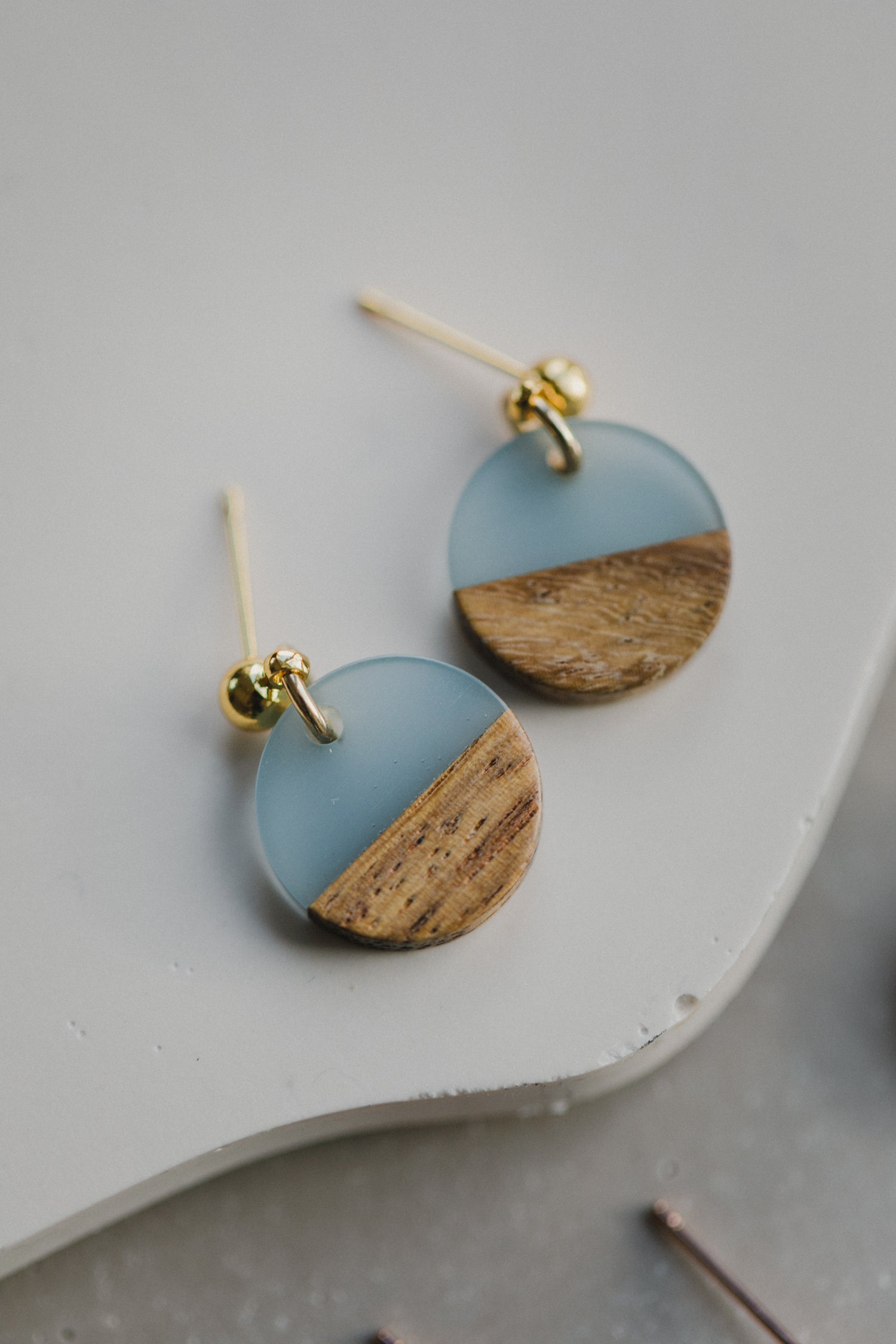 round blue wooden earrings