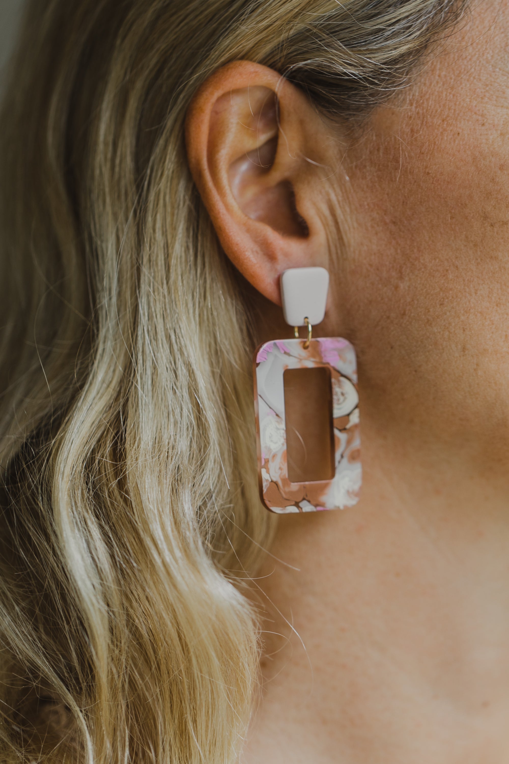 golden earrings with acrylic in white, petrol and brown