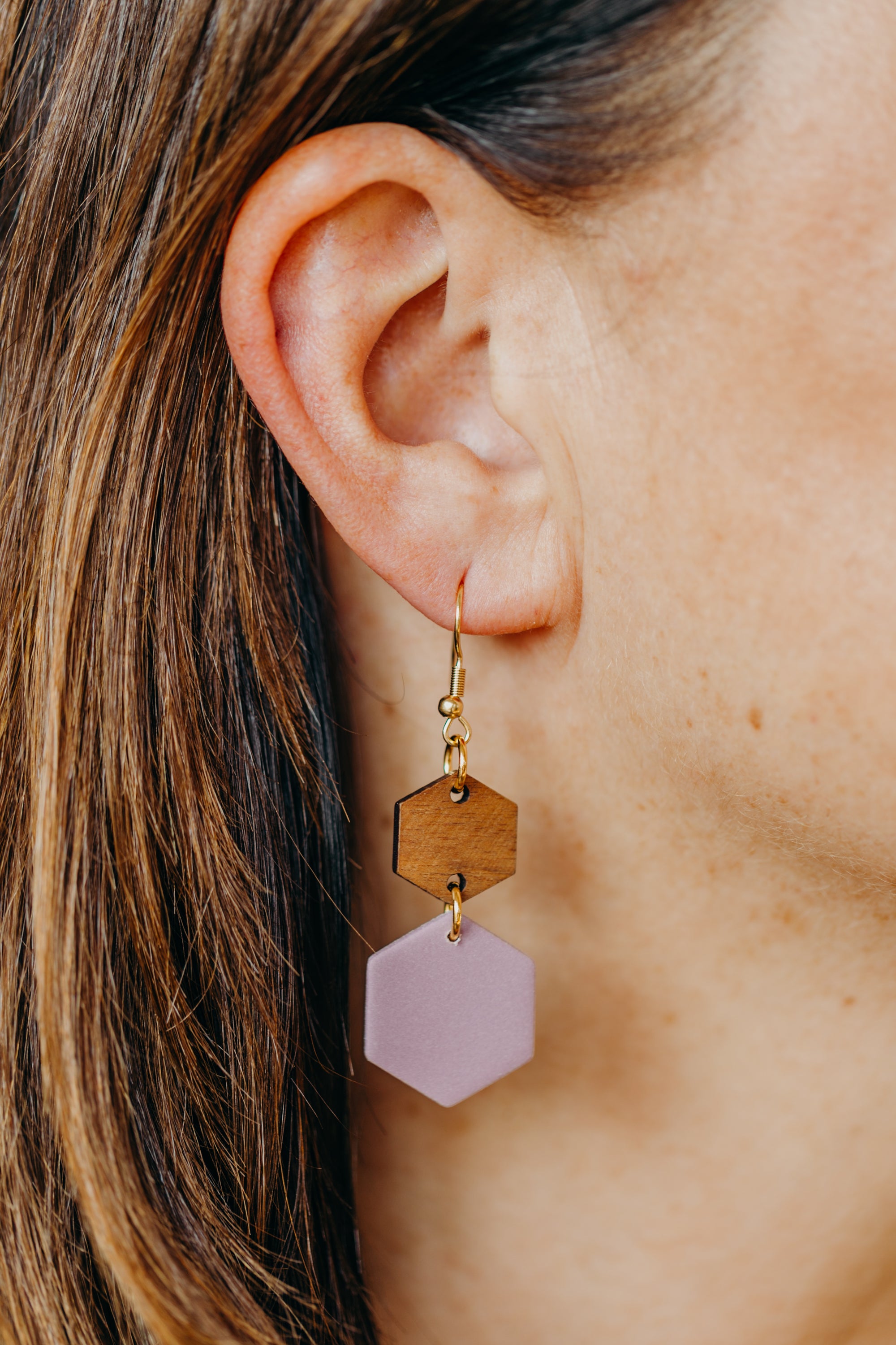 triangular polymer clay earrings in eucalyptus green with rectangular wooden pendant