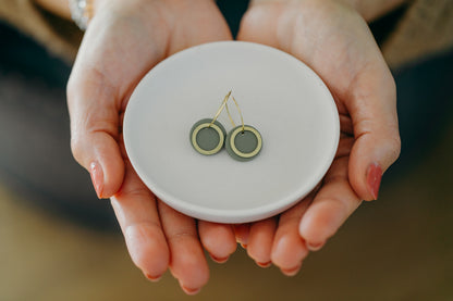 Hoop earrings with round polymer clay pendant and leaf