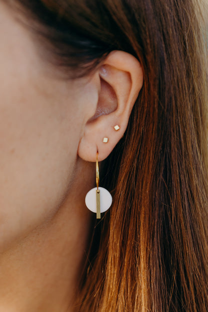 Hoop earrings with round polymer clay pendant and leaf