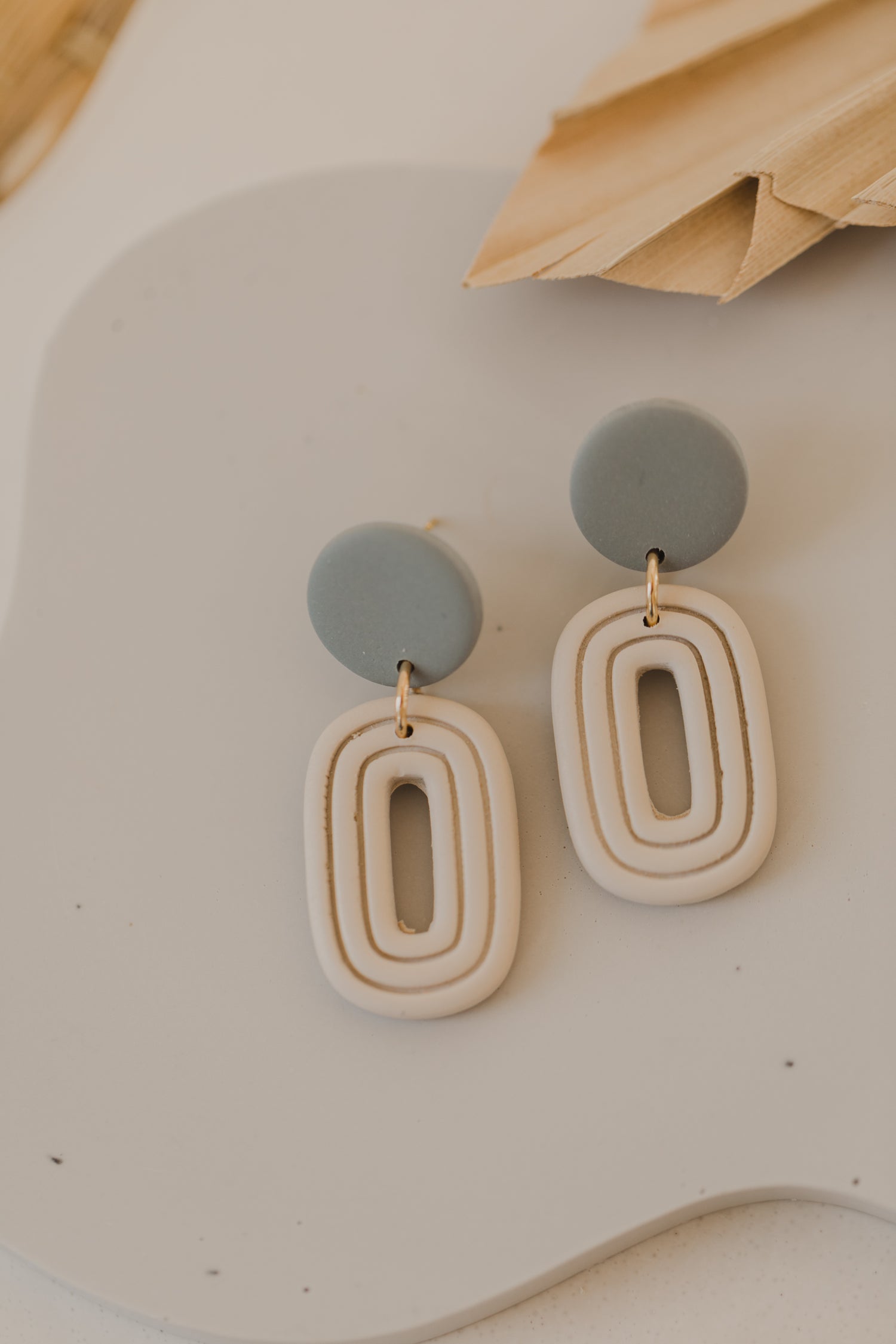 round polymer clay earrings with brass pendant circle