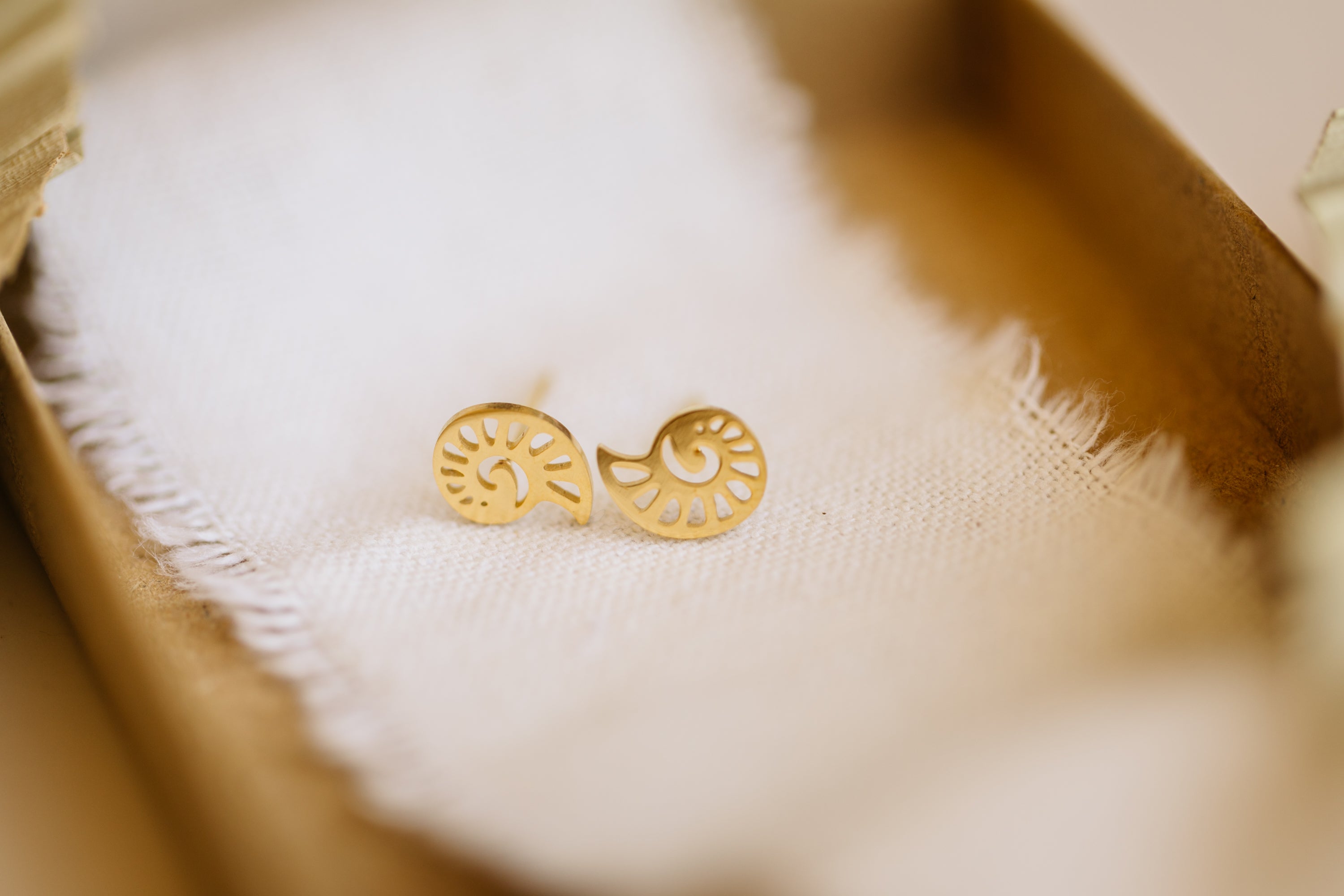 snail ear studs