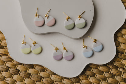 round two-tone earrings made of polymer clay in pastel colors