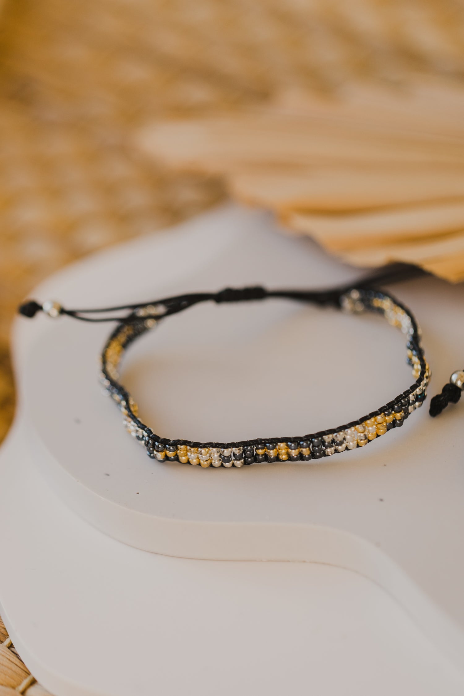 black bracelet made of rocaille beads