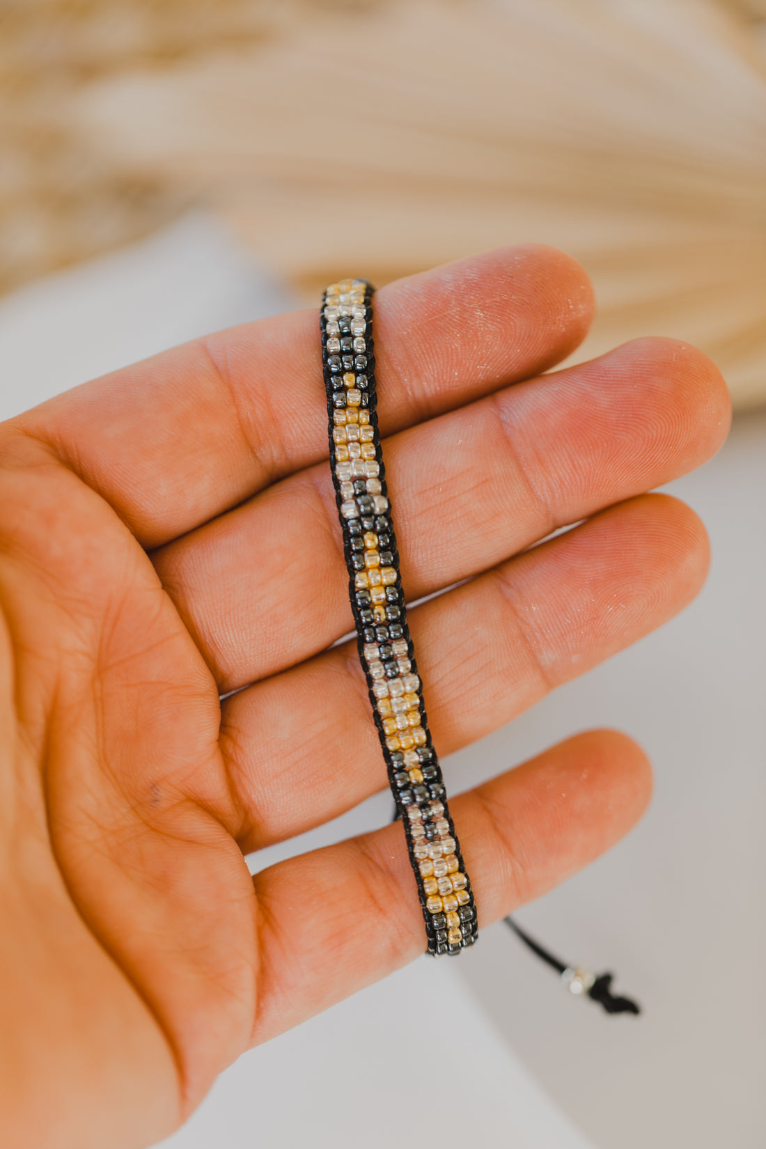 black bracelet made of rocaille beads