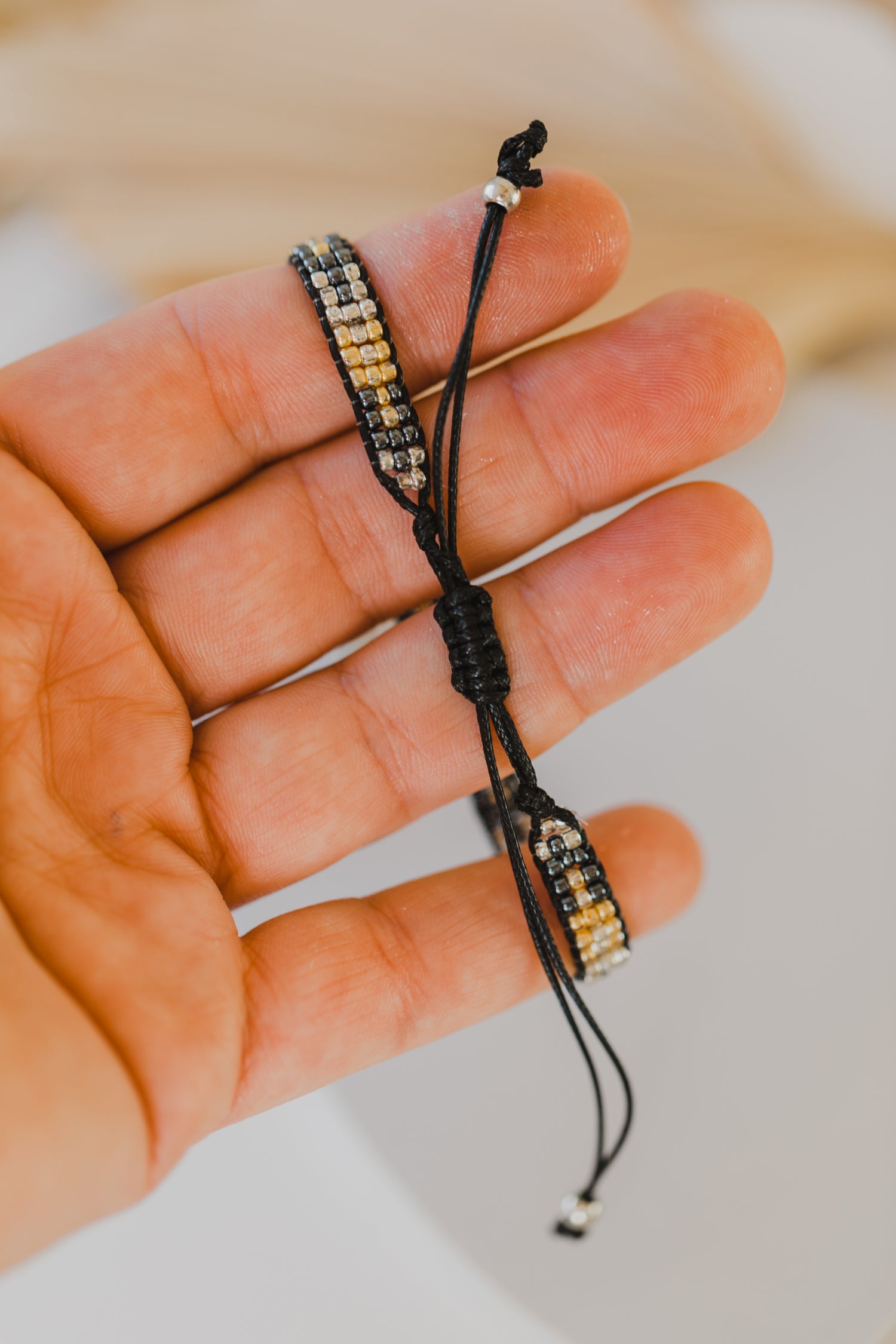 black bracelet made of rocaille beads