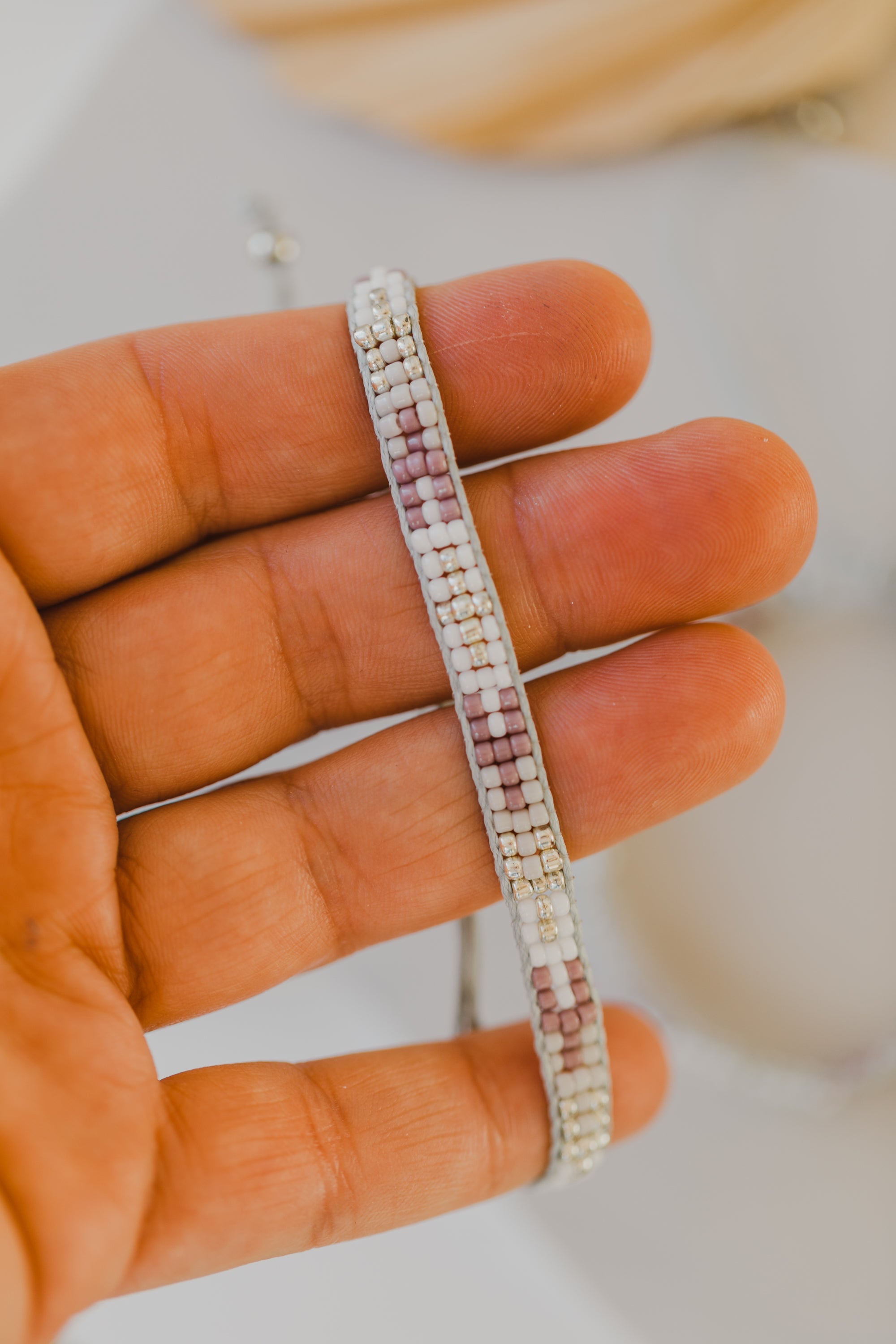 white purple bracelet made of rocailles beads