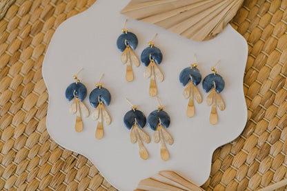 Hoop earrings with round polymer clay pendant and leaf