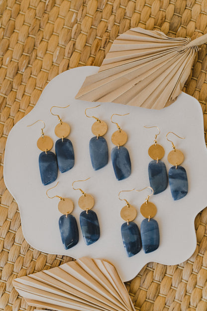 Hoop earrings with round polymer clay pendant and leaf