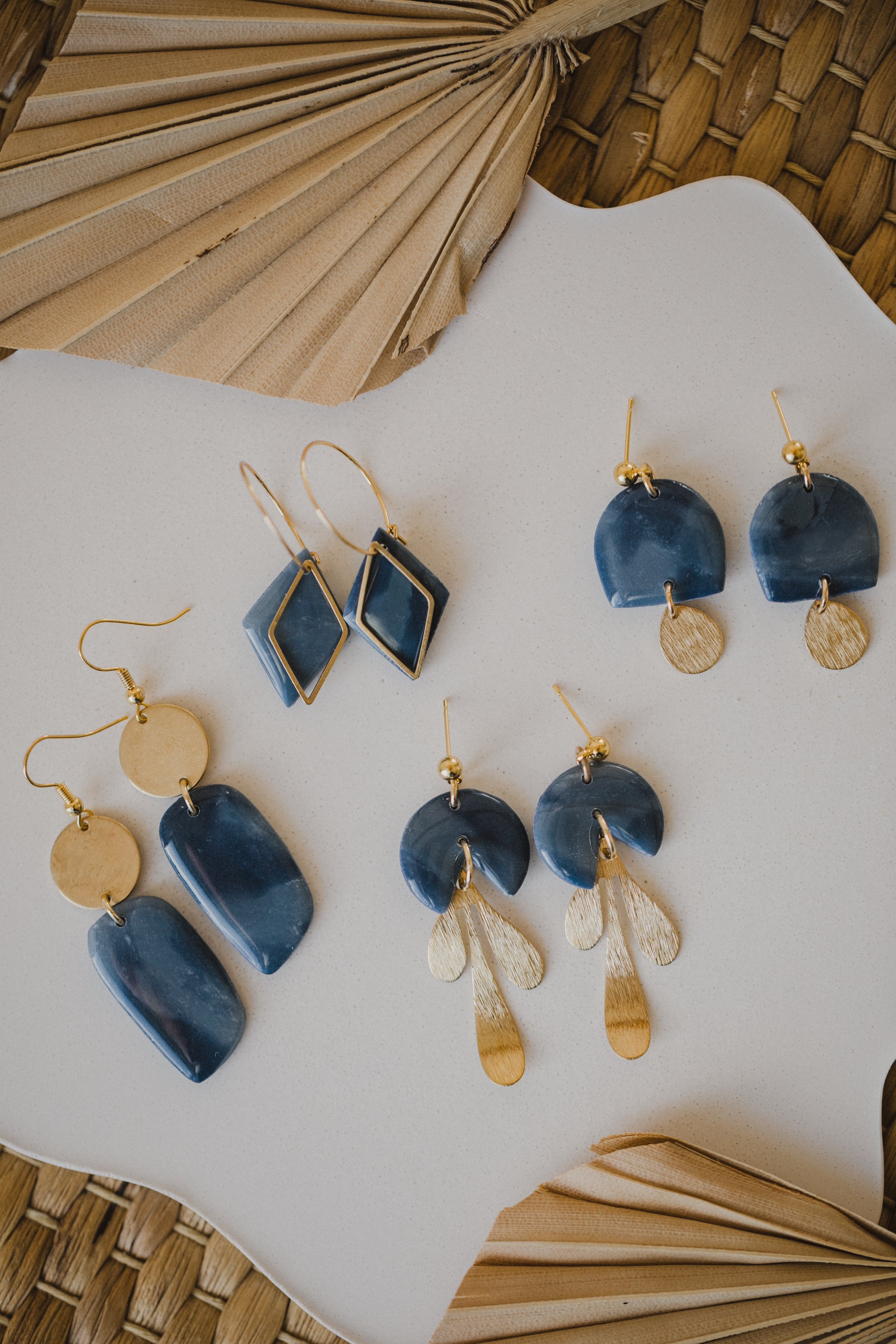 Hoop earrings with round polymer clay pendant and leaf