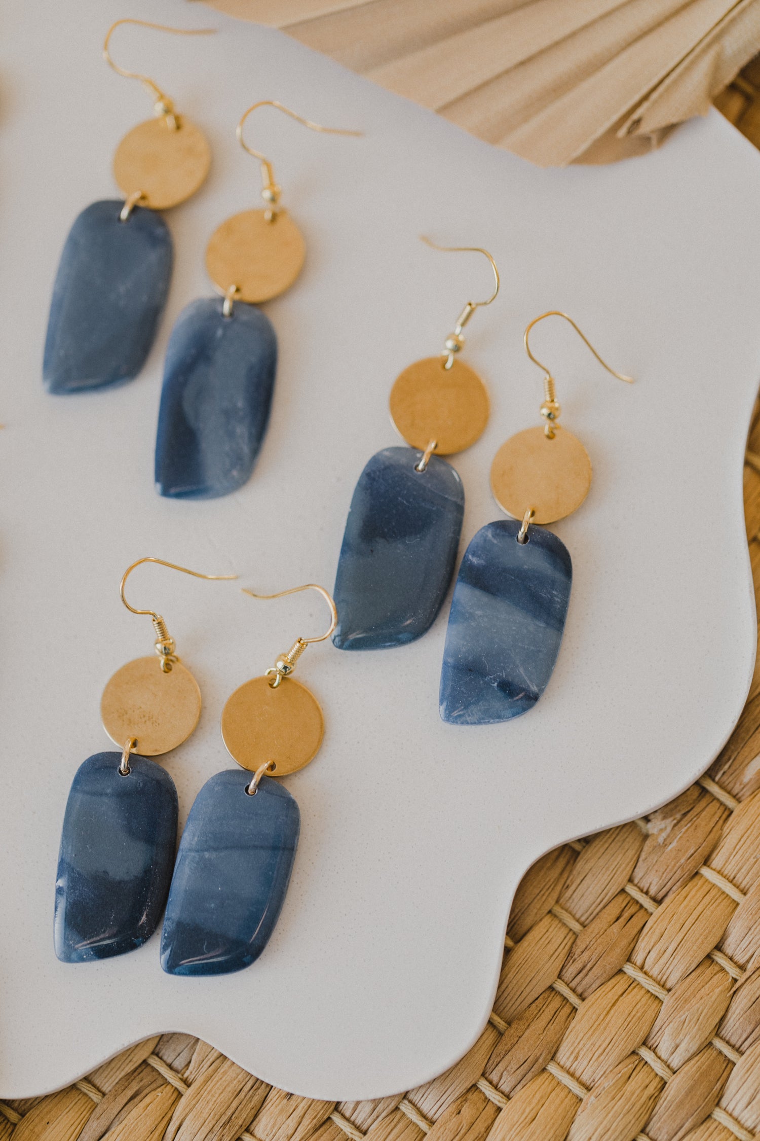 Hoop earrings with round polymer clay pendant and leaf