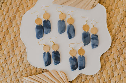 Hoop earrings with round polymer clay pendant and leaf