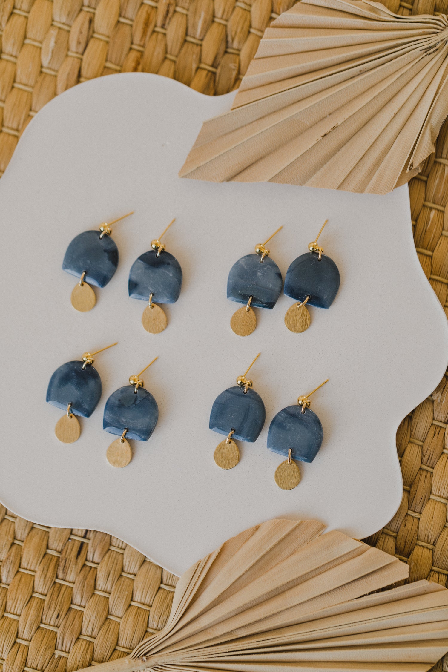 Hoop earrings with round polymer clay pendant and leaf