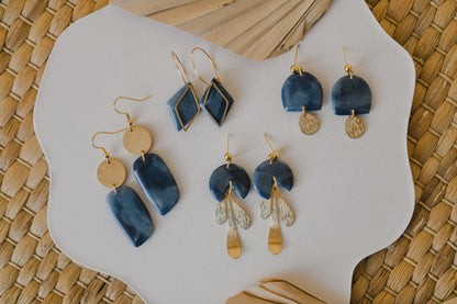 Hoop earrings with round polymer clay pendant and leaf