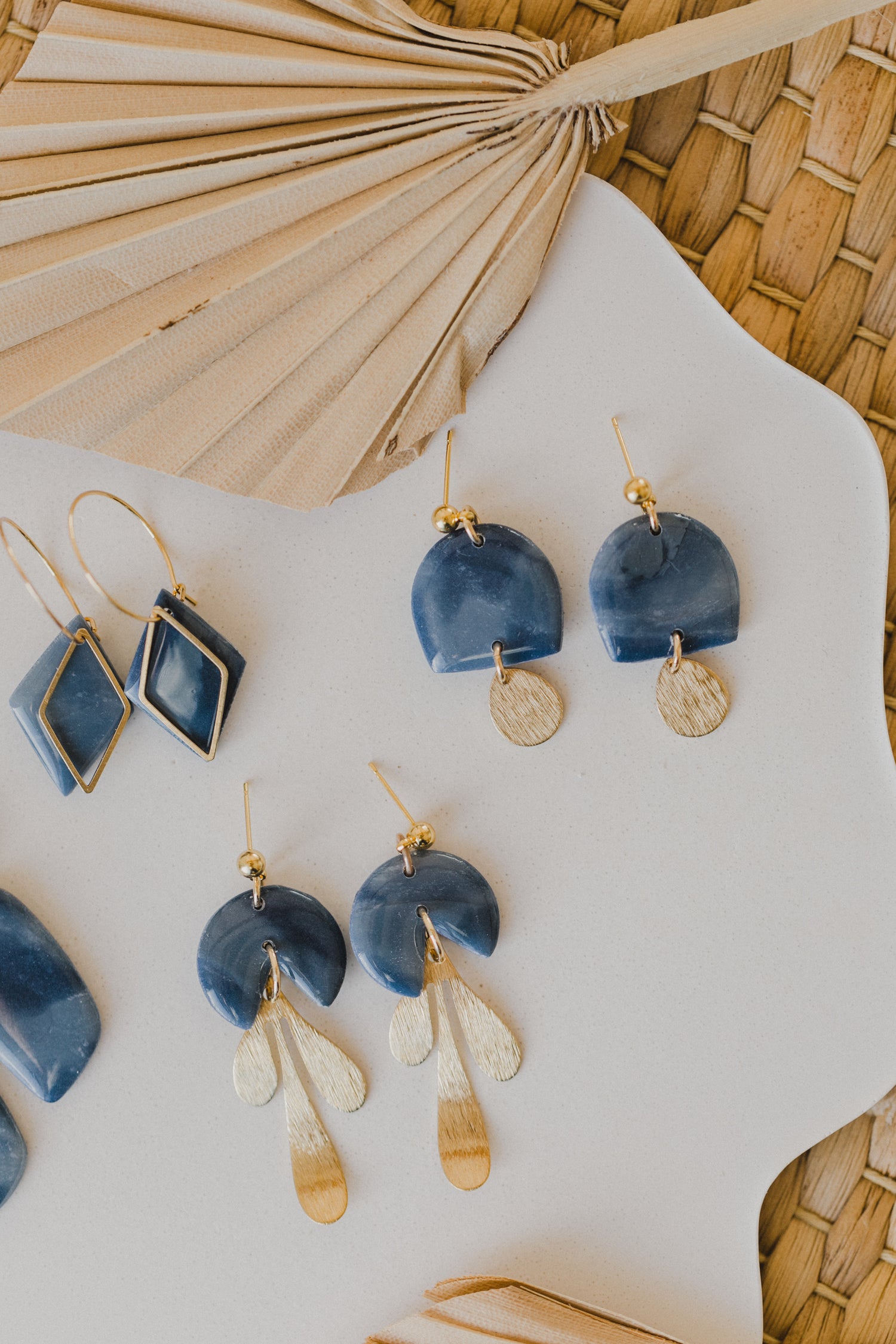 Hoop earrings with round polymer clay pendant and leaf