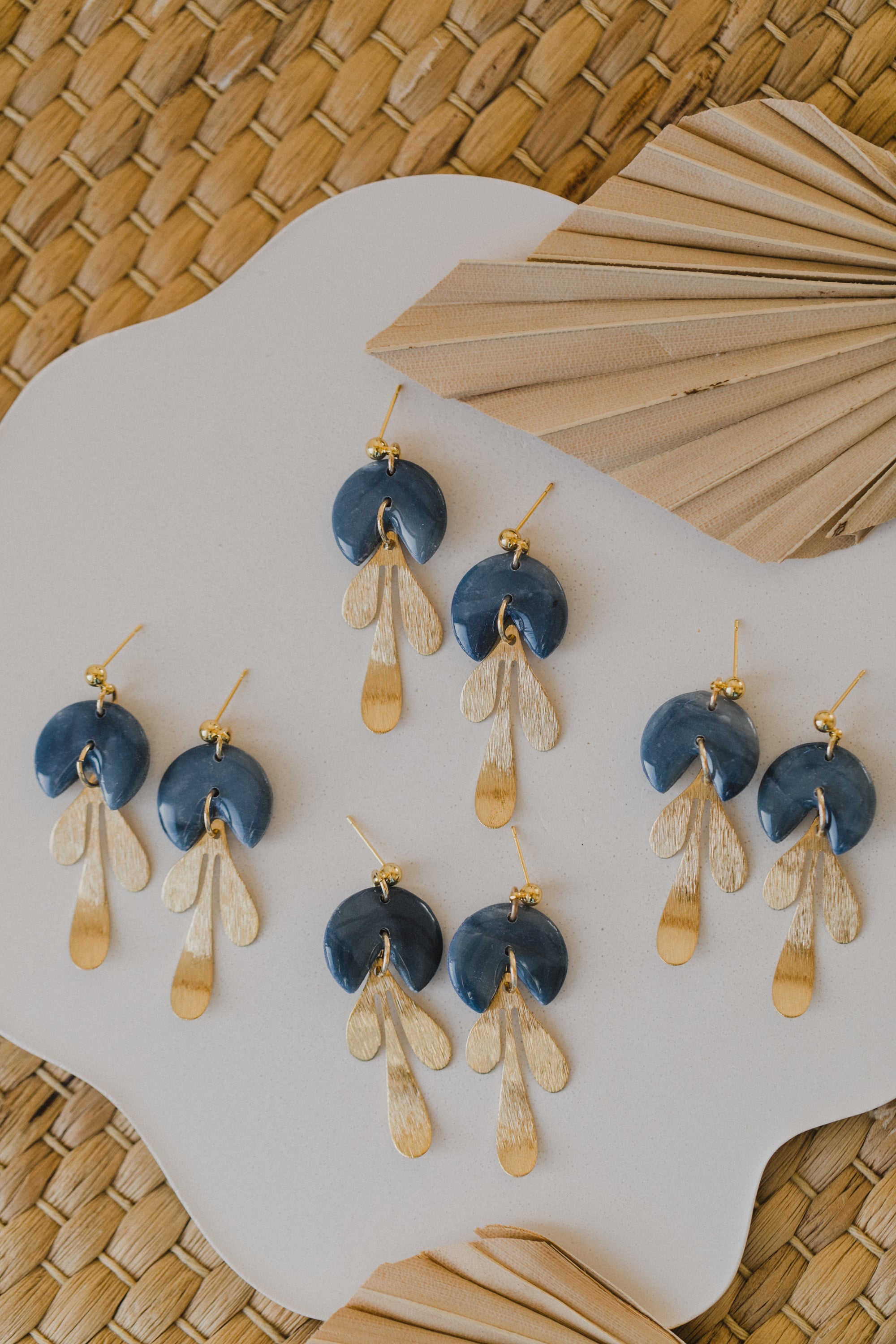 Hoop earrings with round polymer clay pendant and leaf