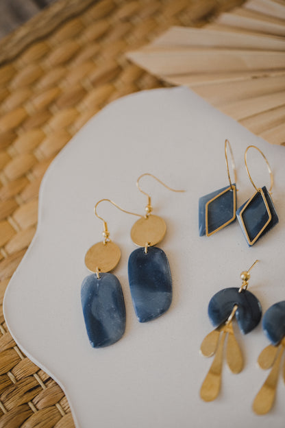 Hoop earrings with round polymer clay pendant and leaf