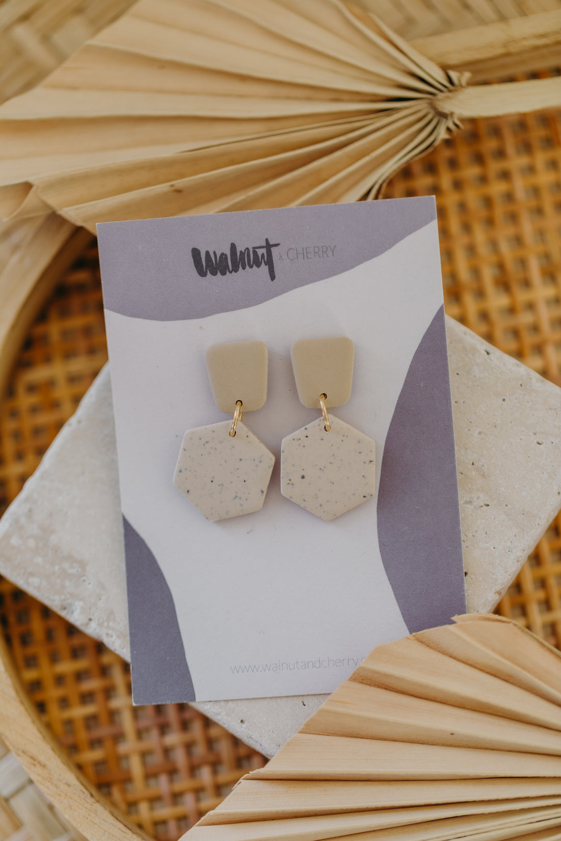 triangular polymer clay earrings in eucalyptus green with rectangular wooden pendant