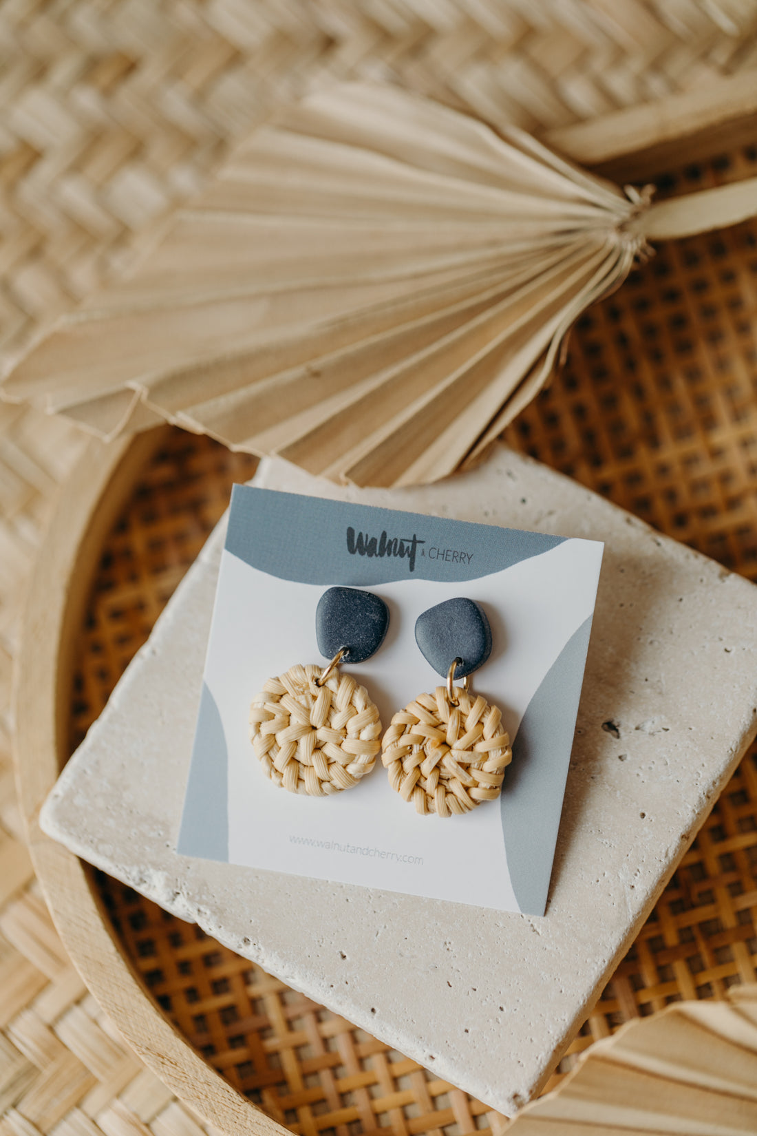 blue polymer clay earrings with round rattan pendant