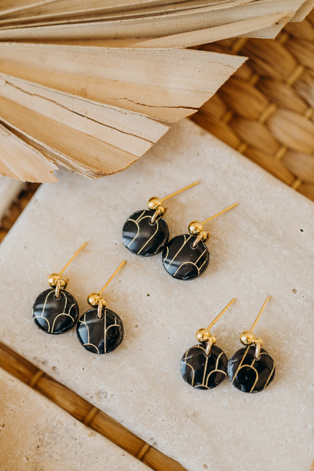 small round black polymer clay earrings