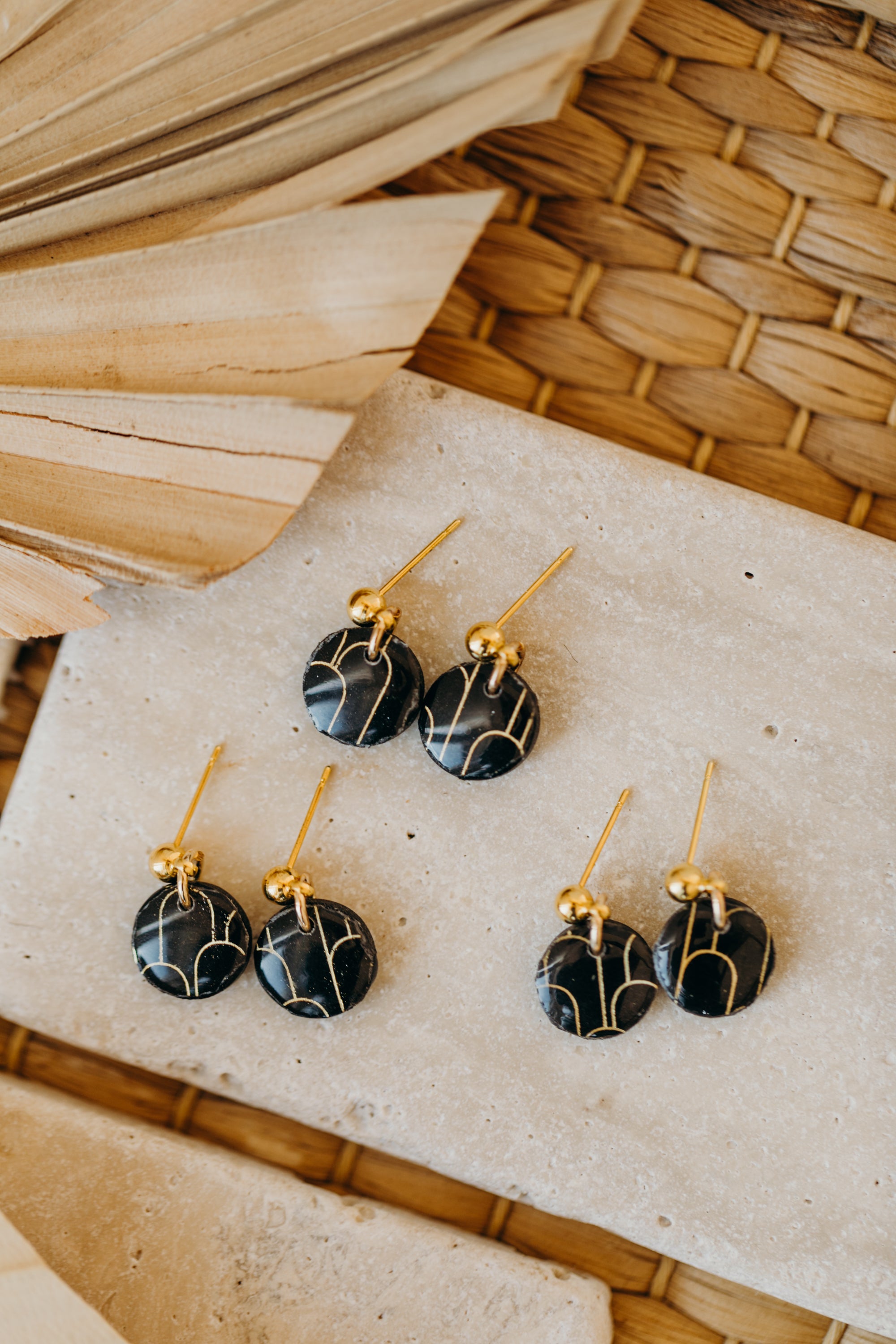 small round black polymer clay earrings