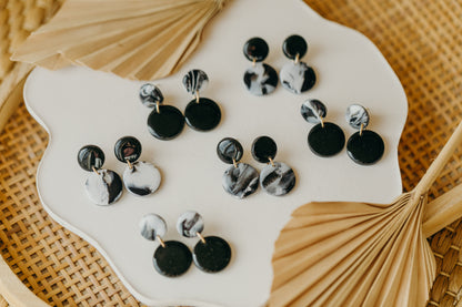 black polymer clay earrings with white pattern