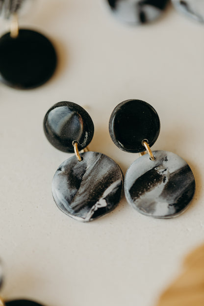 black polymer clay earrings with white pattern