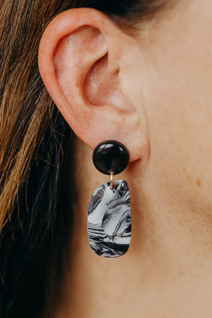 black polymer clay earrings with white pattern